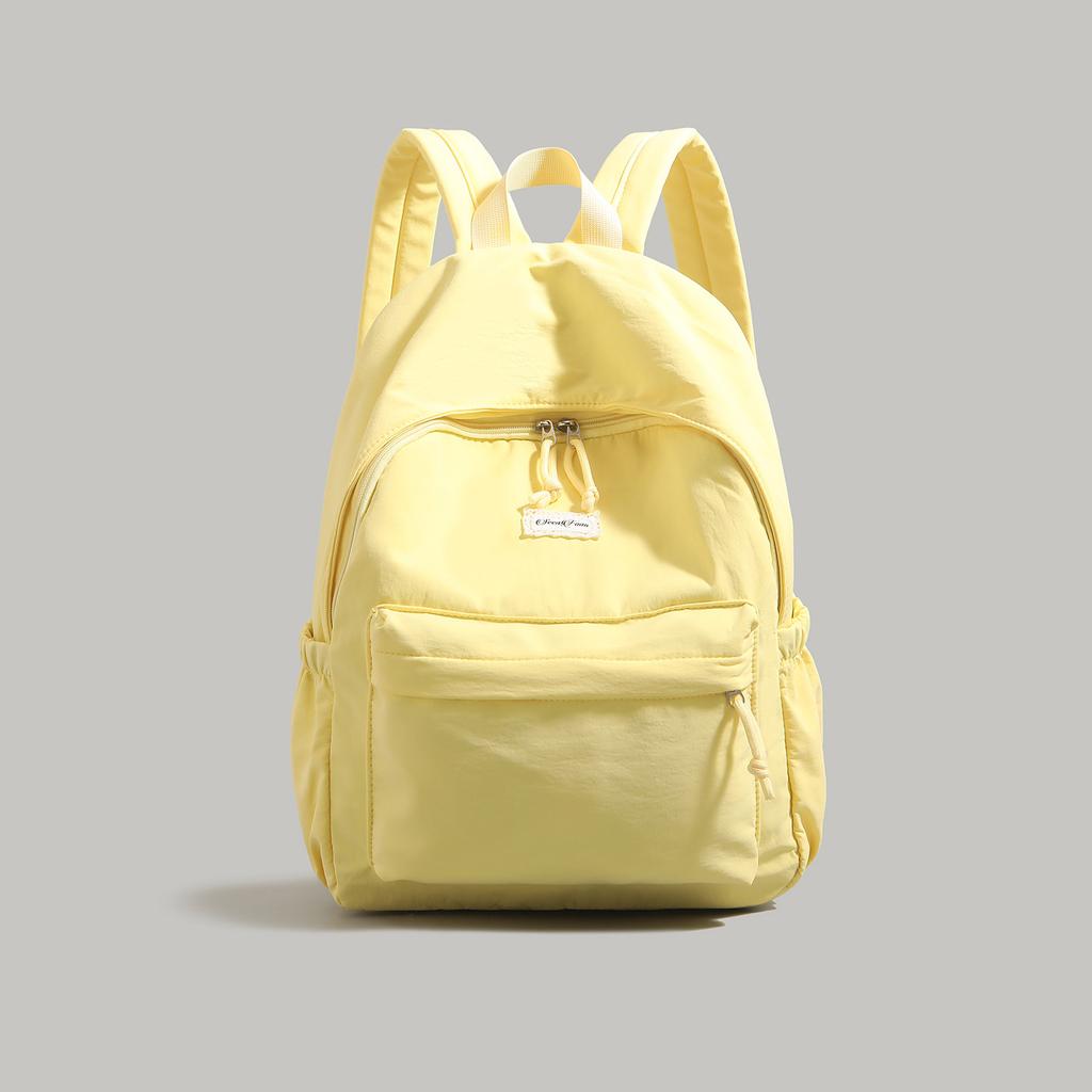 High-value solid-color backpack women's 2025 new college student schoolbag large-capacity lightweight short-distance travel backpack