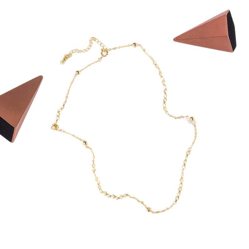 Collana clavicola con cuore di paillettes e perline: Lusso Leggero, Stile Estivo Fresco, Design di Alta Gamma