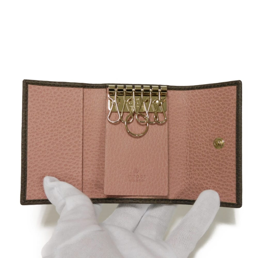 Used 6-ring keychain (product numbers 9539, 354499, CAO2G, 2160, 7949) in pink with a two-tone snap button and cursive