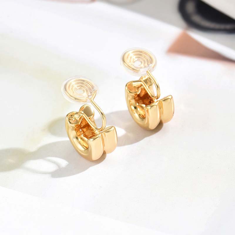 

Vintage Metal Twisted Round Ear Clip Earrings for Women 2026 New Fashion Gold Color Geometric Hollow Drop Earrings Zircon Gifts