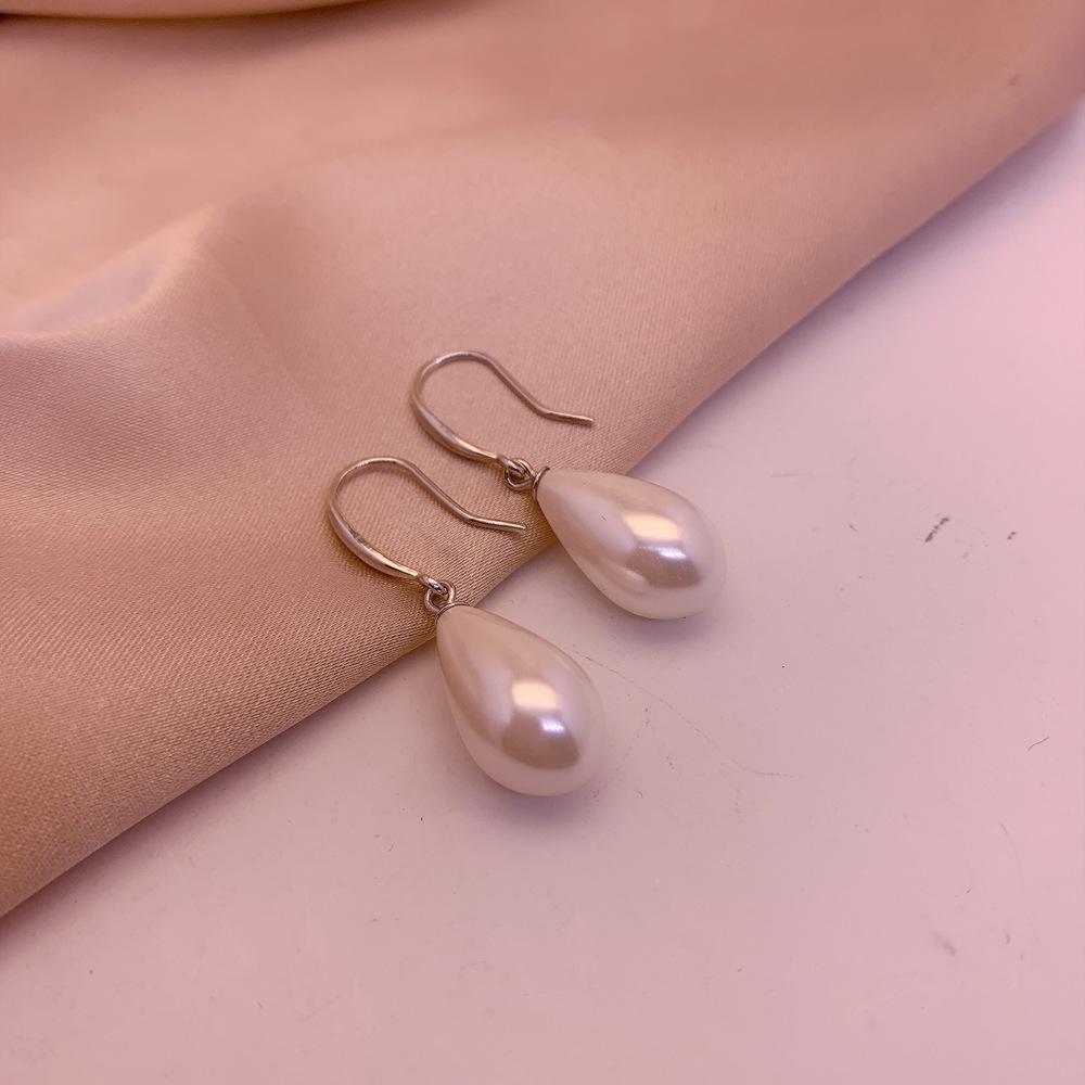 

Water drop pearl earrings women s fashion temperament design earrings high-end explosive earrings срібний