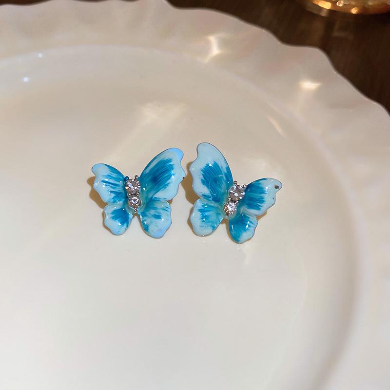 

Silver Needle Butterfly Drip Oil Stud Earrings - Elegant Literary Design for Women