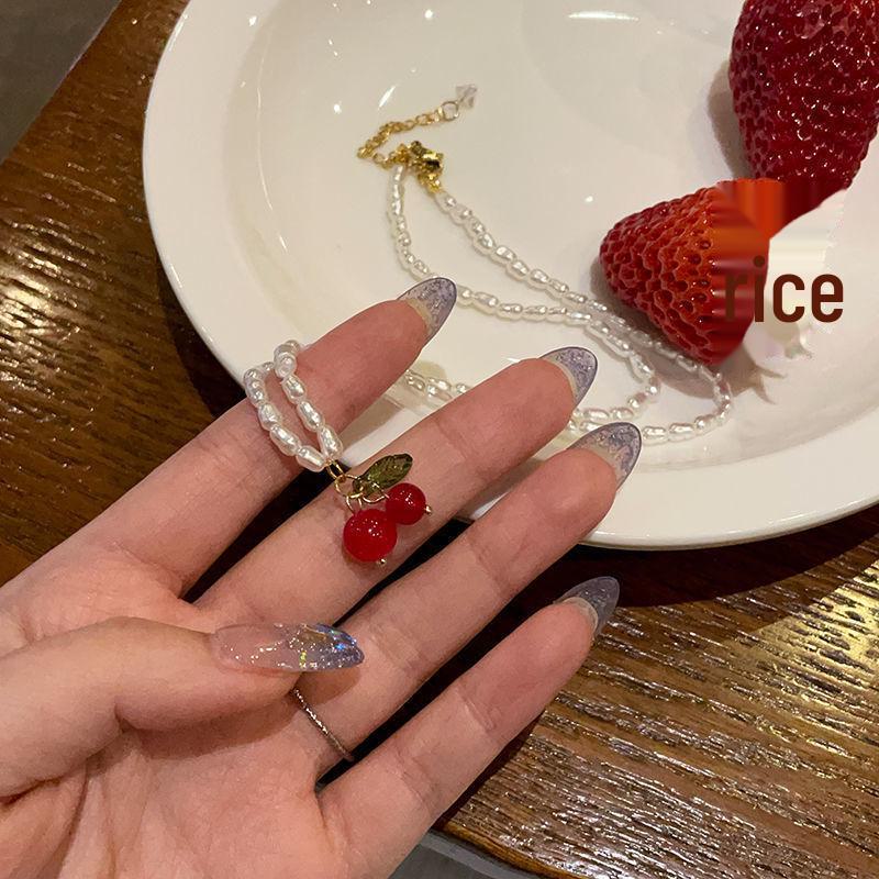 

Элегантное жемчужно-вишневое ожерелье - летняя легкая роскошь для женщин