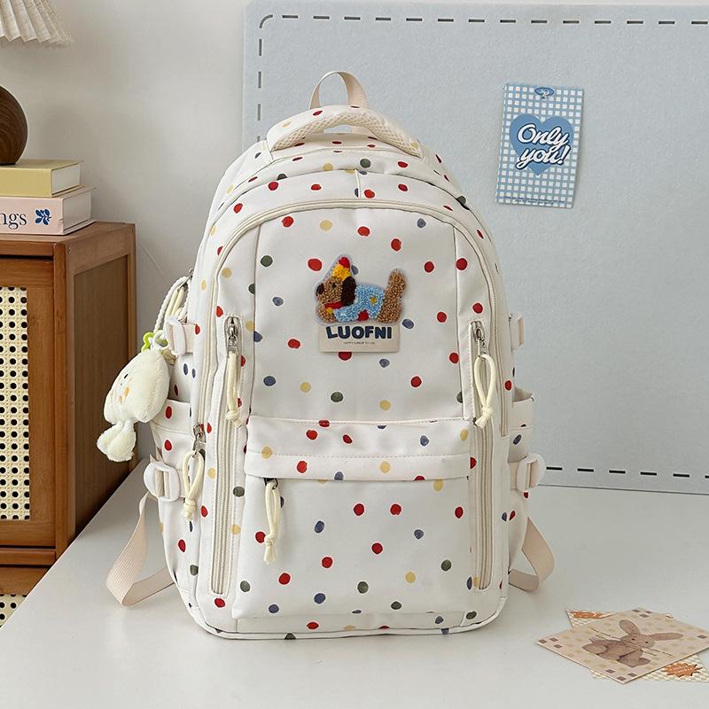 New junior high school backpack female junior high school schoolbag ins niche polka dot cute large-capacity backpack
