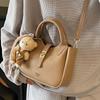 Wholesale hot sale simple temperament light luxury lychee pattern portable bucket bag niche design versatile commuter messenger bag