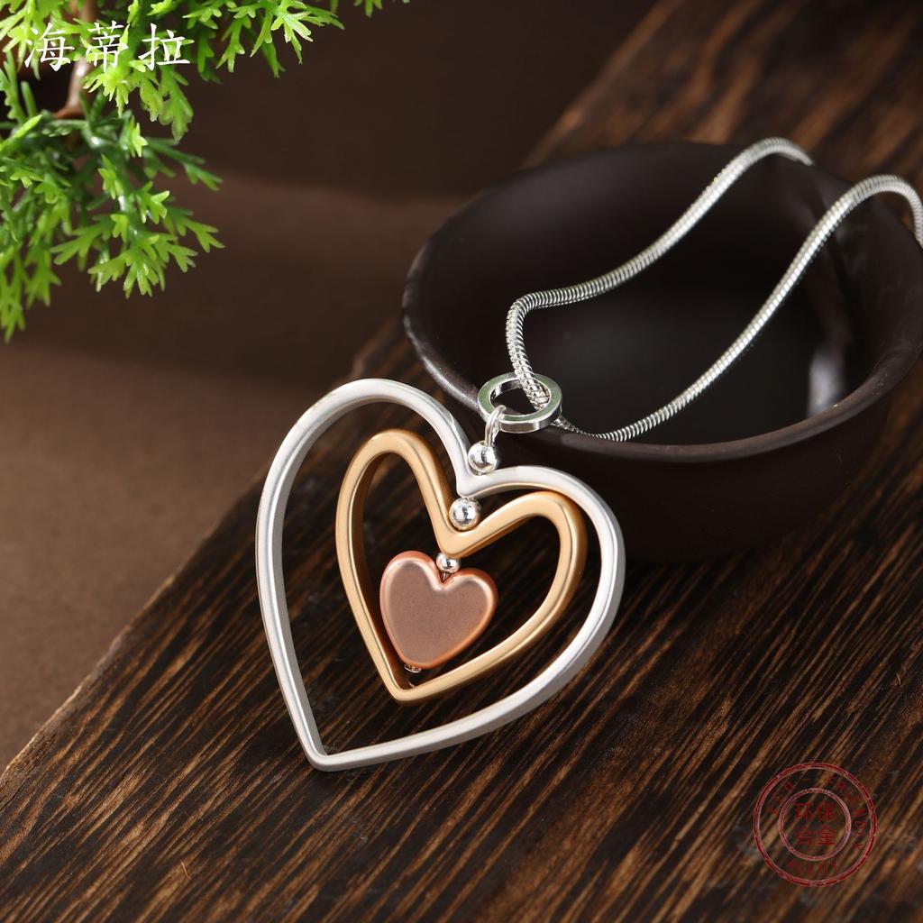 New matte three-layer hollow heart long pendant, women's hollow rotating heart-shaped versatile long necklace