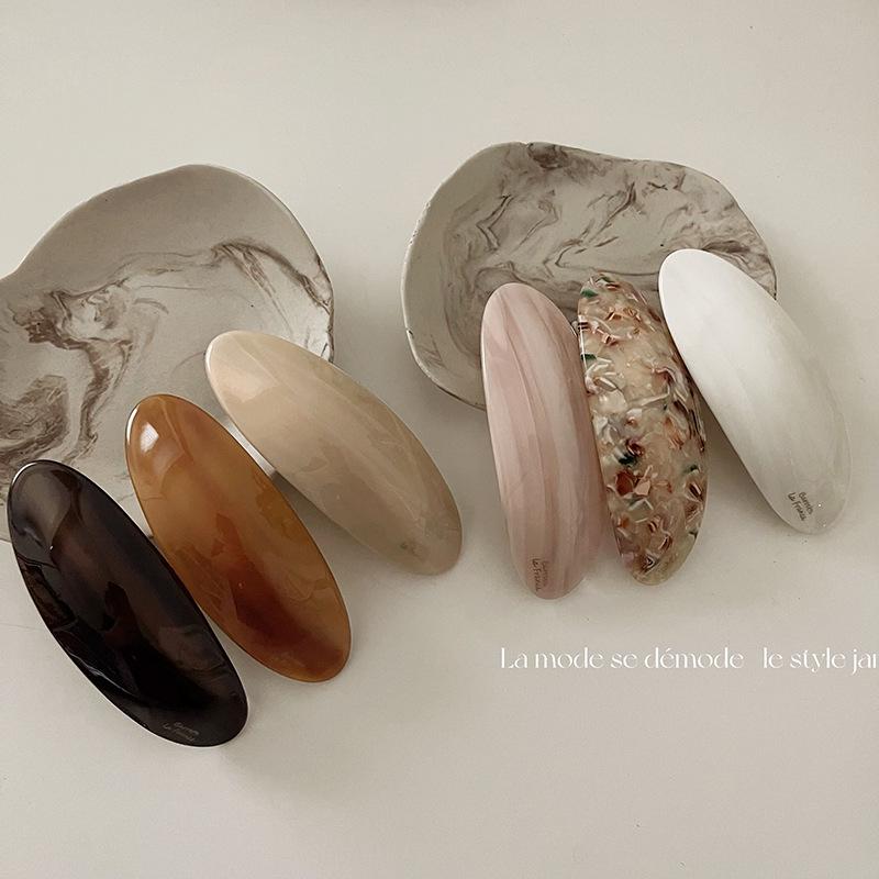 Koreanische Haarklammer mit Gold-Label-Textur - Halboffene Federklammer Kopfschmuck