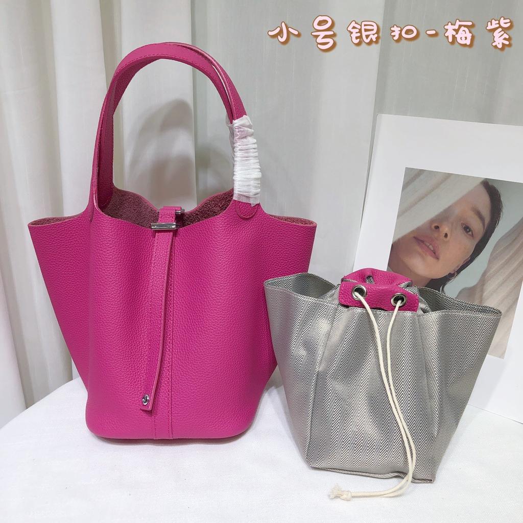 Spot wholesale top layer cowhide vegetable basket bag leather bucket bag commuter fashion lock buckle hand-held handbag woman