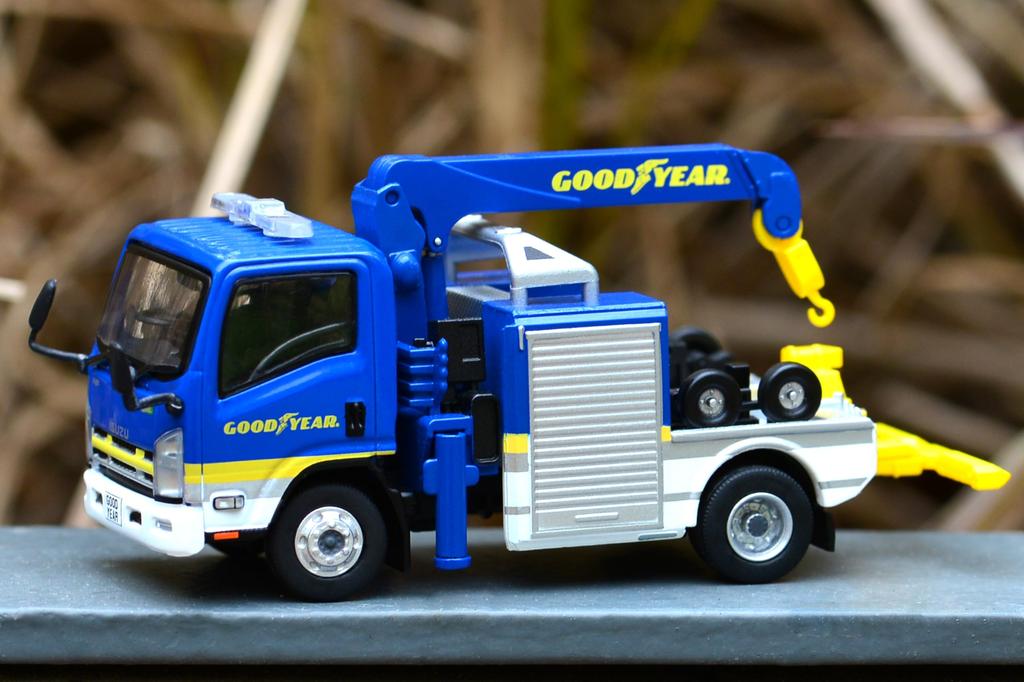 Tiny City 1/76 scale diecast model car of the Isuzu N-Series Tow Truck by Goodyear