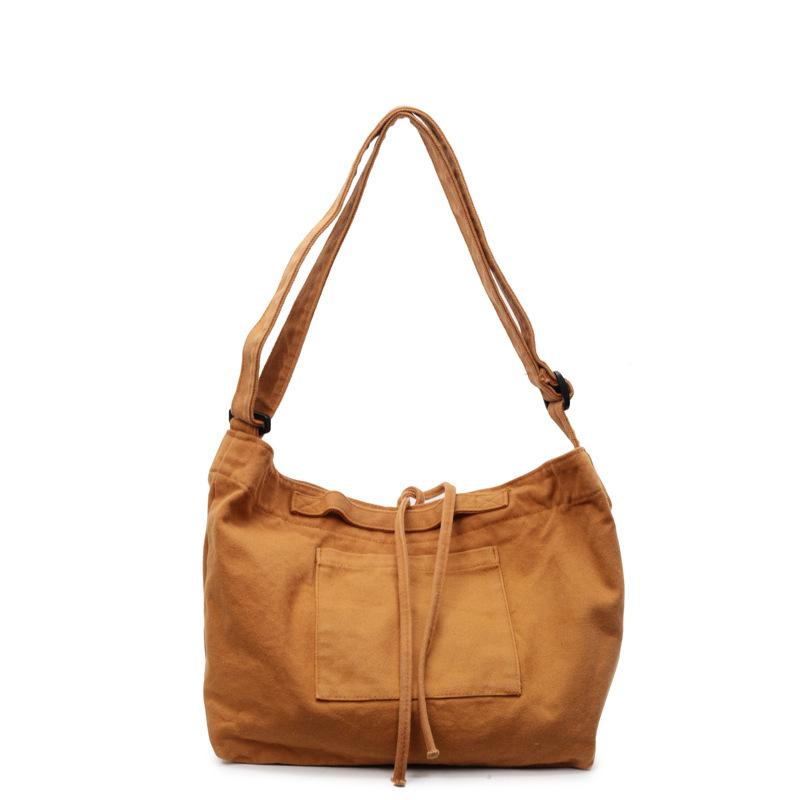 Stylish, simple and large-capacity cloth bag, new solid color shoulder bag, Korean version trendy portable messenger bag.