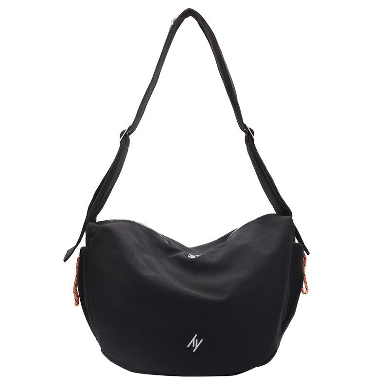 Literary and simple solid color fashion messenger bag women's 2025 early spring large-capacity trendy brand casual shoulder dumpling bag