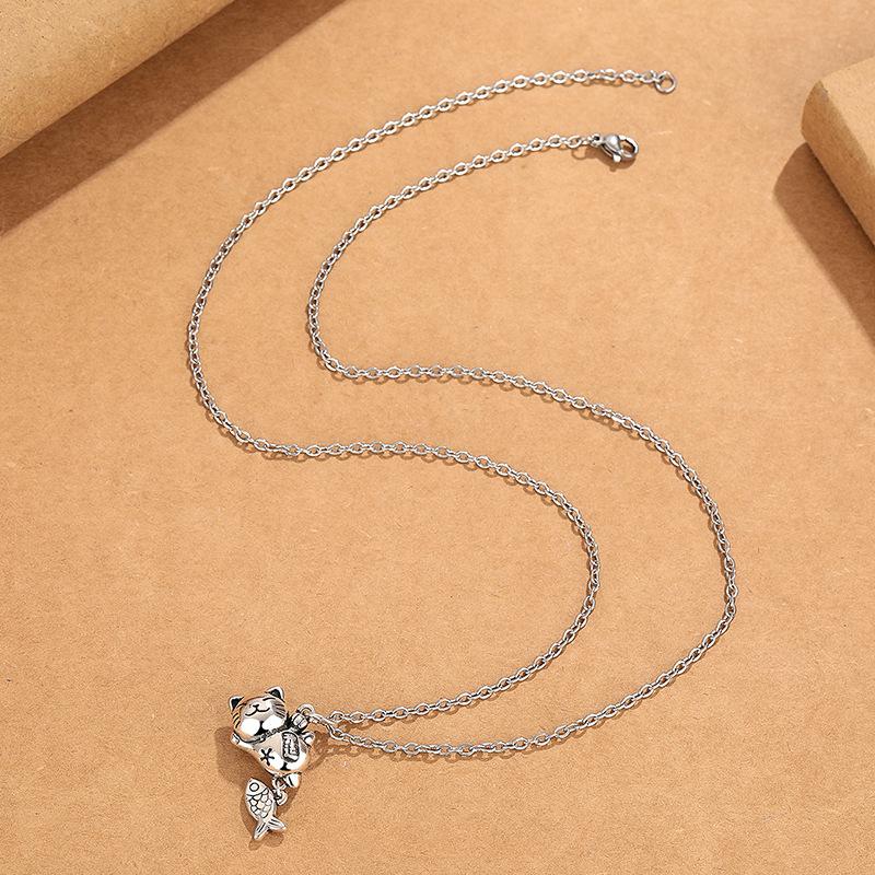 

Cat eating fish pendant necklace, retro and simple, Instagram style.