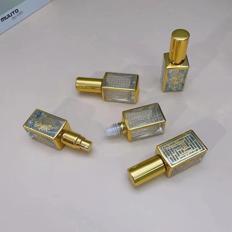 2 Pcs/set Random Pattern Luxury Golden Essential Oil Roller Bottle Refillable Perfume Bottle Glass Roll-On Essential Oil Bottle Cosmetics Container