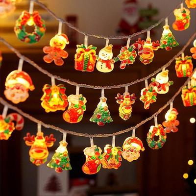 Warm White Christmas String Lights and Ornaments - Snowman, Tree, Old Man Reindeer Decorations.