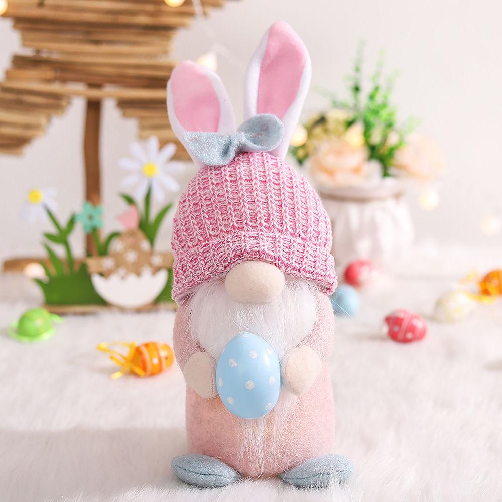 

Christmas and Easter Decorations with Lights, Faceless Old Man Dolls, Glowing Bunny Ornaments, New Year s Gift Items рожевий