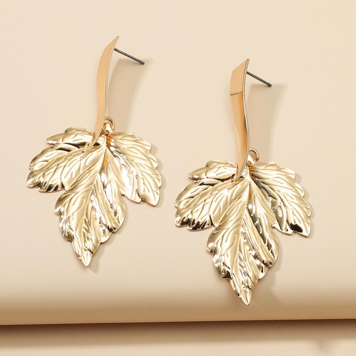 

2021 Fashion Simple Metal Maple Leaf Earrings Women s Popular Dangle Earrings Party Zircon Accessories