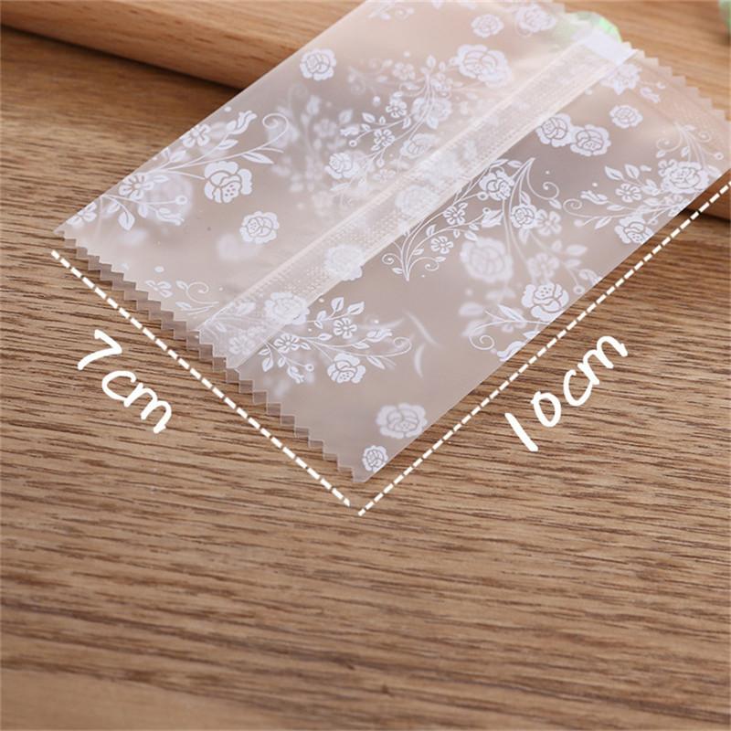 100Pcs Translucent Frosted Rose Flower Pattern Fruit Tea Candy Cookie Machine Sealed Bags Plastic Packaging