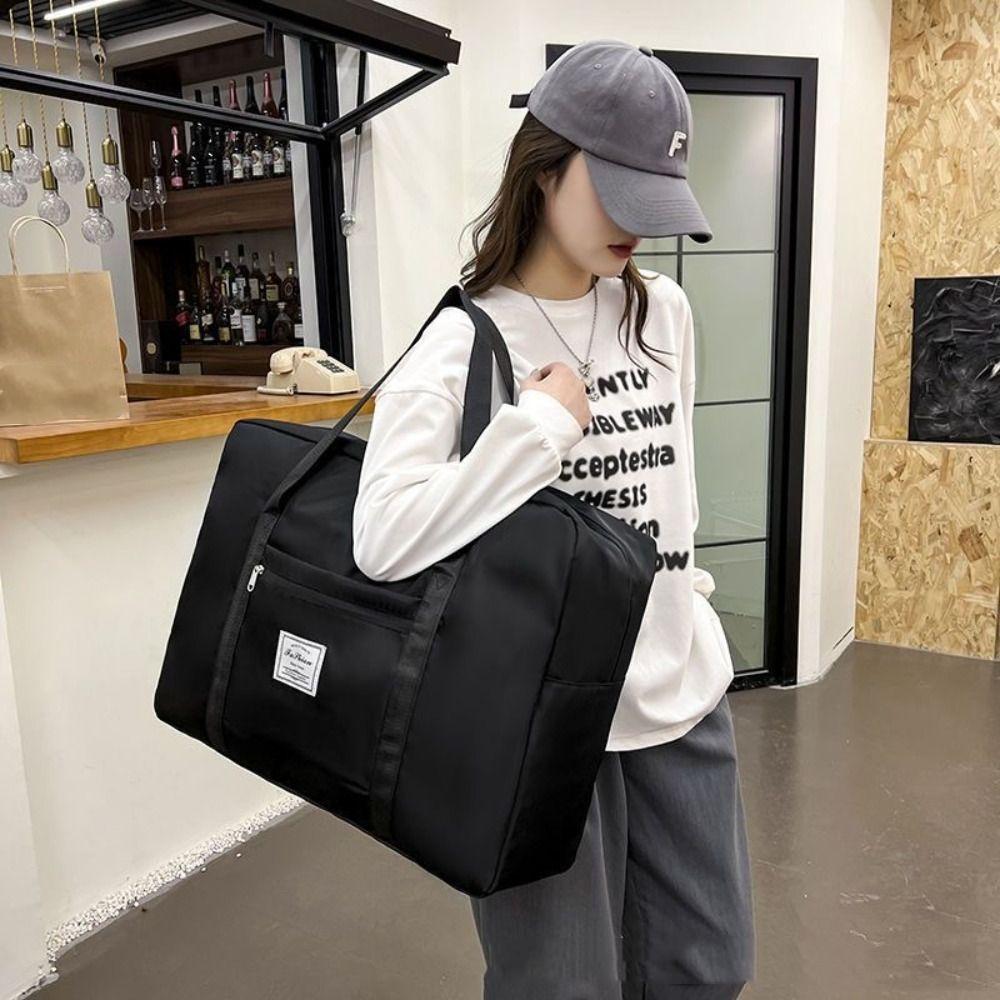 Große Kapazität Reisegepäcktasche Faltbare Reisehandtaschen Tragbare Reiseaufbewahrungstasche Kleidersack