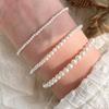 Elegant Multi-Piece Faux Pearl Bracelet for Women - Versatile, Elastic, and Stackable.