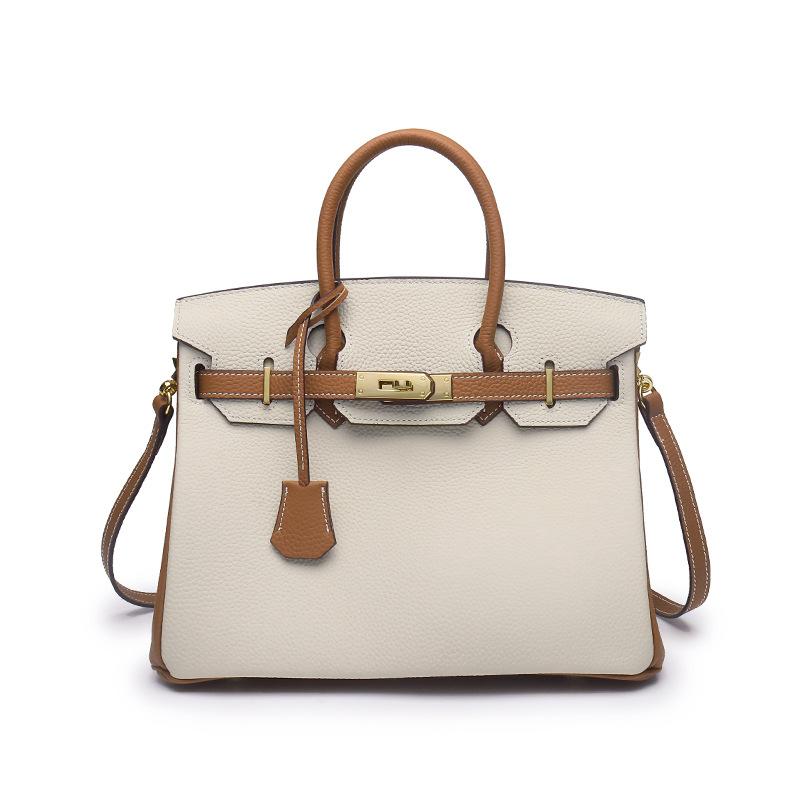 2021 Spring new trendy leather handbag top layer cowhide capacity one-shoulder crossbody hand-carried platinum bag