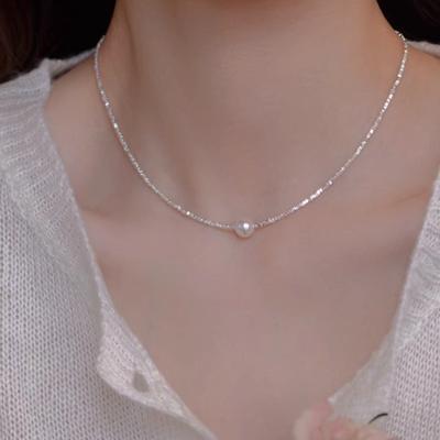 Collier de perles d'argent brisé de haute qualité pour femmes, nouvelle chaîne de clavicule populaire de luxe léger de niche, chaîne de cou style vent froid d'été