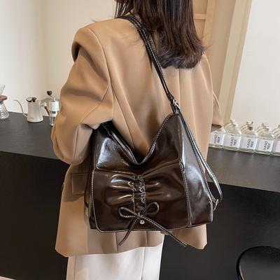 Koreanische Version Nische Handtasche 2025 Winter neue Damentasche Retro Schleife Schultertasche personalisierte plissierte Umhängetasche