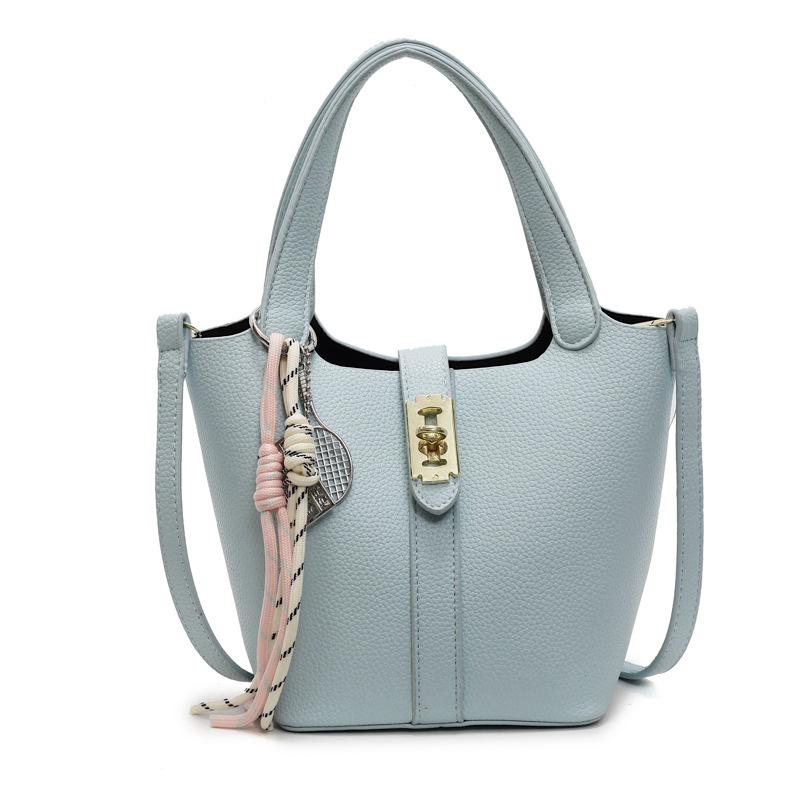 This Year's Popular Simple Ou Ruofeng Lychee Pattern Hand Carrying Bucket Bag Fashion Temperament Versatile High Sense Messenger Women's Bag