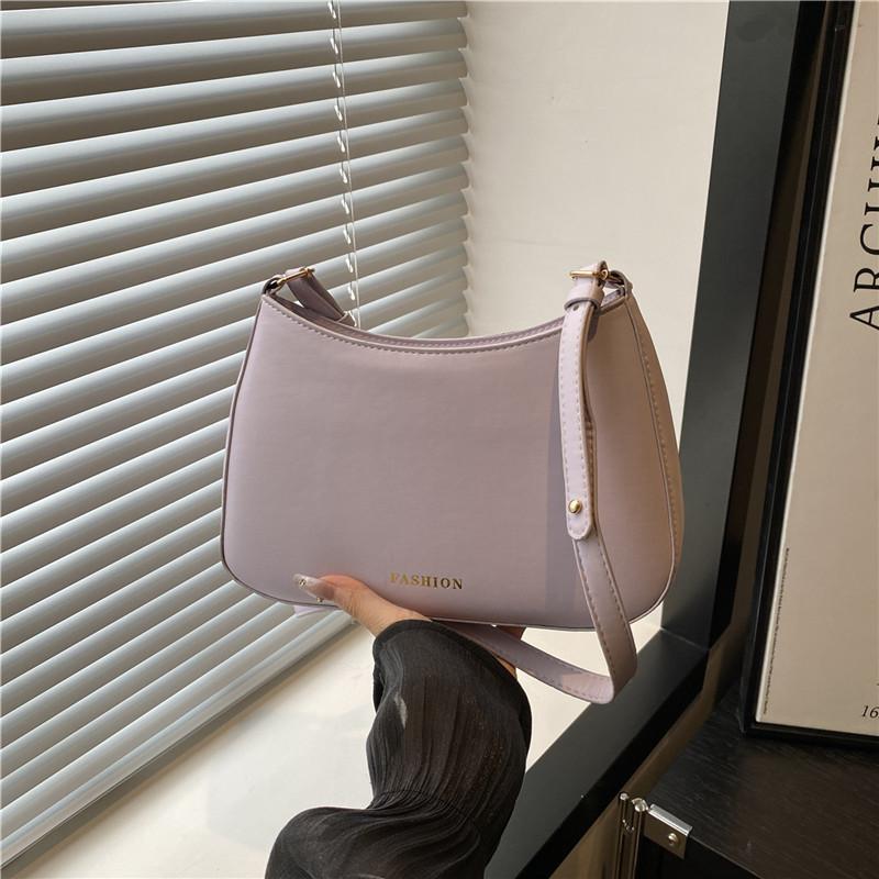 

Корейская версия нишевая сумка подмышку женская 2025 новая трендовая универсальная сумка через плечо с цепочкой, сумка-мессенджер, текстурная сумка-седло в иностранном стиле фиолетовый