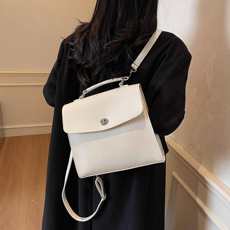 

2025 new oil wax pu niche design handbag tote bag travel backpack 27*10*23 чёрный