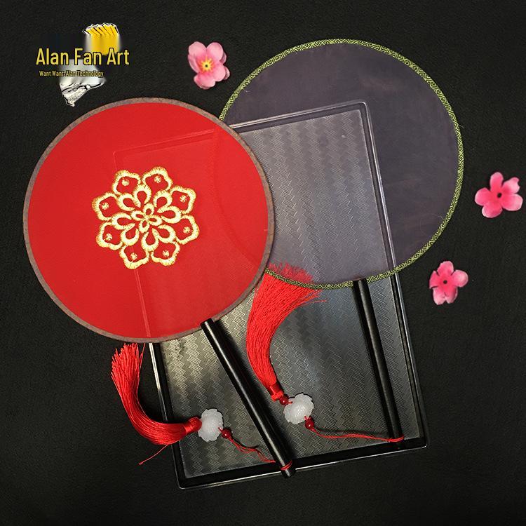 Éventail rond en soie rouge Hanfu ancien, orné d'un long pompon, pour la mariée.