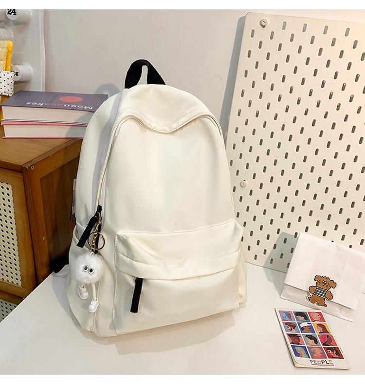 School bag new fashion solid color large capacity school bag Korean version ins versatile simple backpack casual spring outing light backpack