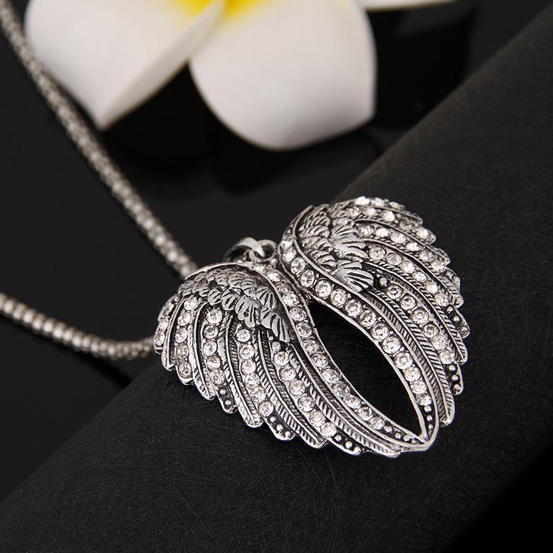 European and American alloy retro diamond-encrusted necklace, peach heart wing necklace with jewelry, long sweater chain for women