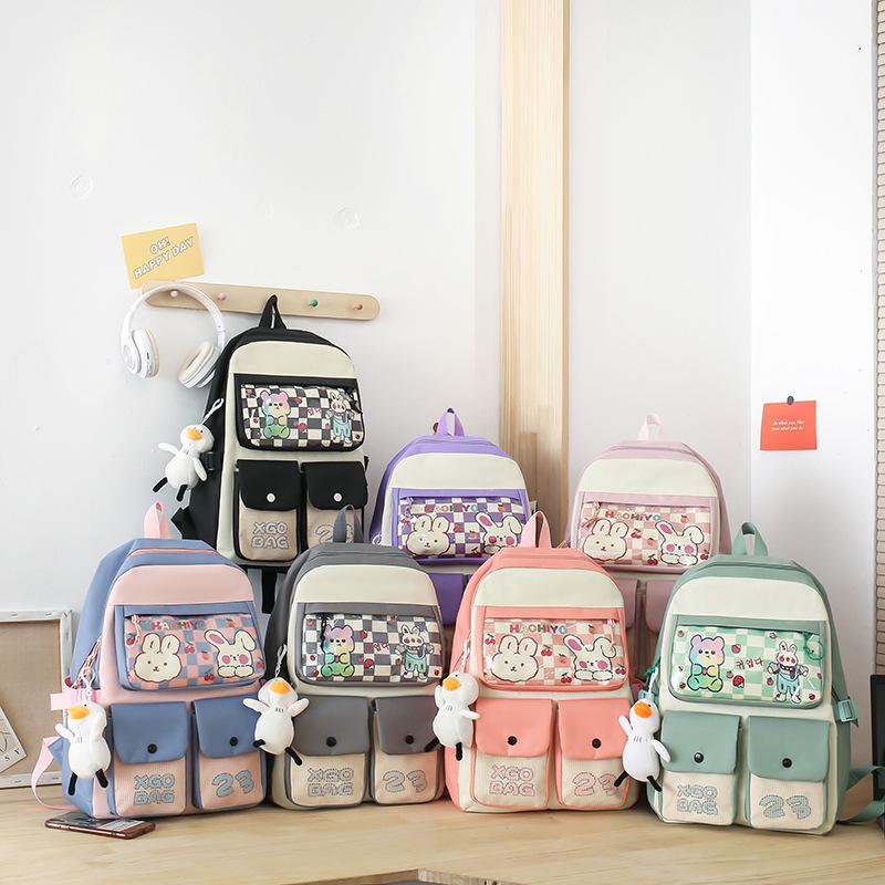 New student four-piece Korean version of cute campus sweet girl backpack large capacity rabbit print leisure bag