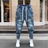 Trekkoord Herenkleding Knap Lente Heren Koreaanse Elastische Taille Knoppen Decoratief Mode Harlan Broeken Heren