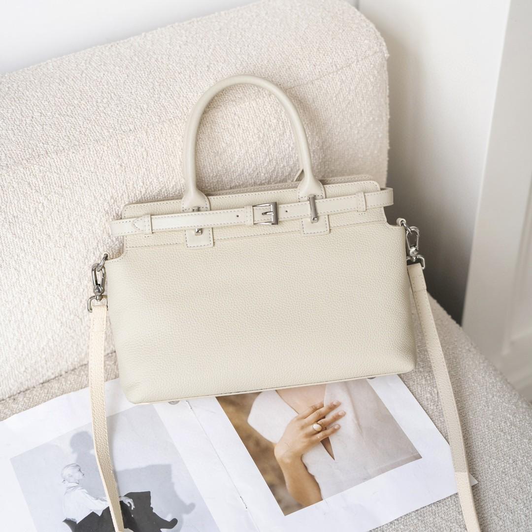 

Высококачественная сумка Pitot. Кожаная сумка через плечо. Простая и универсальная сумка для поездок на работу. 29 * 21 * 10CM