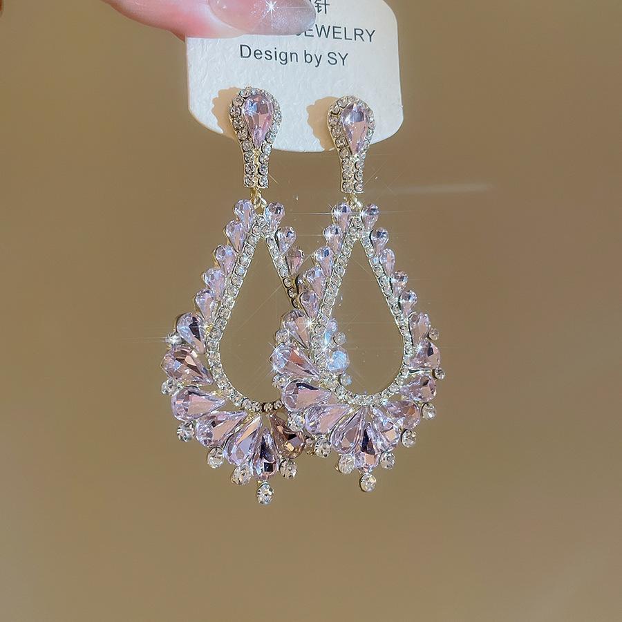 

Корейские серьги-пусеты в форме капли воды, полые, роскошные, высокого класса, супер блестящие, модные, универсальные, изысканные серьги для новогоднего ужина, женские