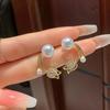 Silver Needle Fashionable Korean Tulip Pearl Cat's Eye Stud Earrings - Exquisite Light Luxury Design