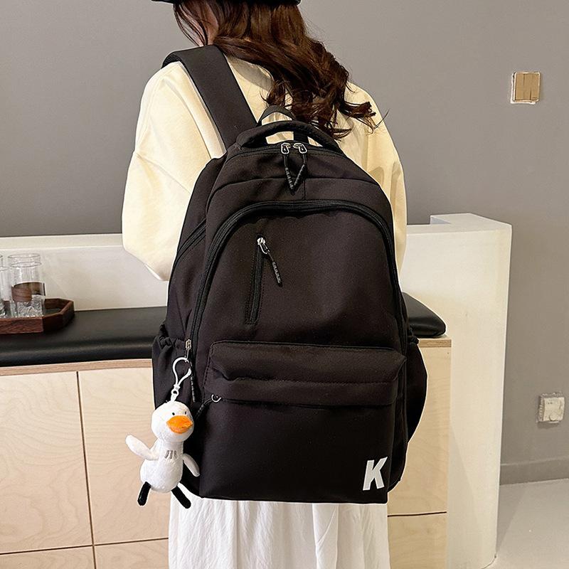 Schoolbag new backpack, junior high school student backpack, large-capacity schoolbag, load-reducing spine protection, large-capacity backpack.