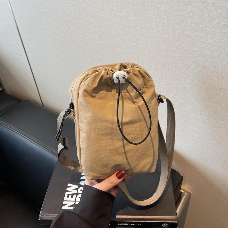 

Mobile phone bag Lightweight ultra-thin waterproof canvas small bag Trendy brand men s and women s messenger bags Versatile walking bags хаки