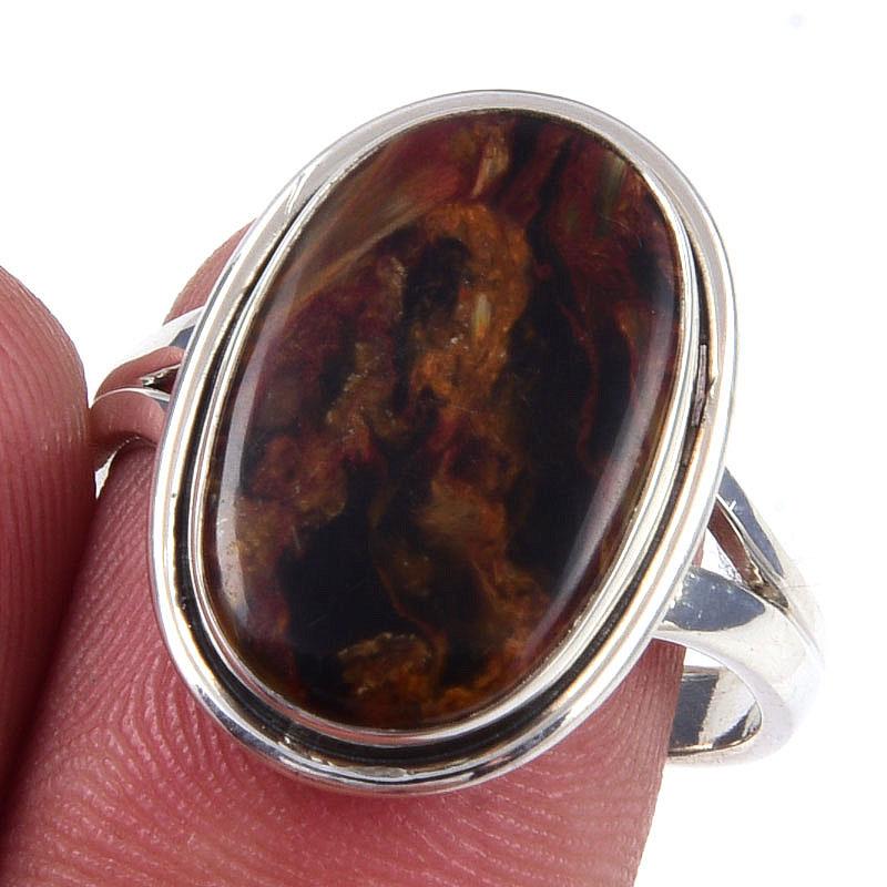 

Кольцо из чистого серебра 925 пробы с натуральным камнем Питерсит, размер 8 l8Y38