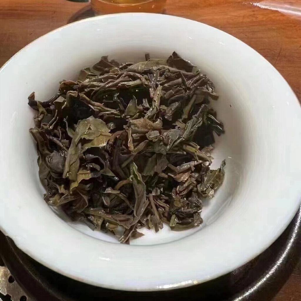 357g Bolo de Chá Pu-erh Cru Antigo de Yunnan 2006 Nannuoshan Bolo de Chá Puer Envelhecido Chá Puerh