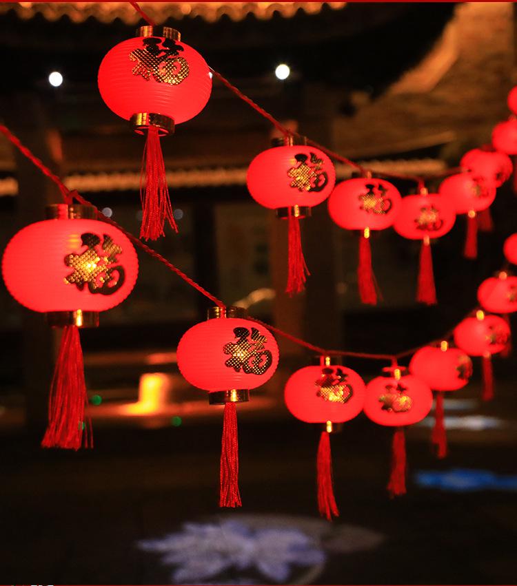 Solar-Powered New Year Lantern String Lights with Fu Character and Lucky Bag Design