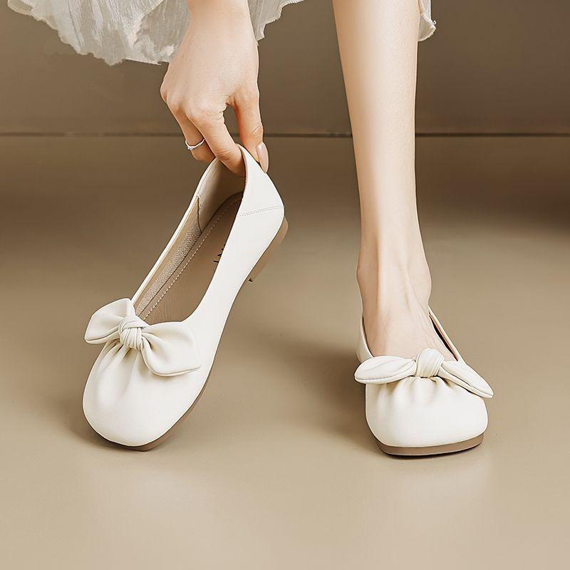Bow flat-soled single shoes women's spring and autumn new shallow mouth round head soft leather comfortable versatile shoes