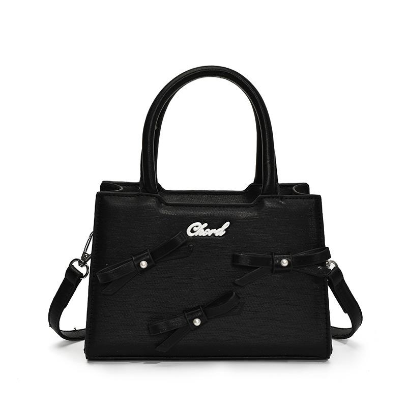 Korean version of bow small square bag women's 2025 summer new simple and fashionable handheld women's bag women's shoulder oblique span bag