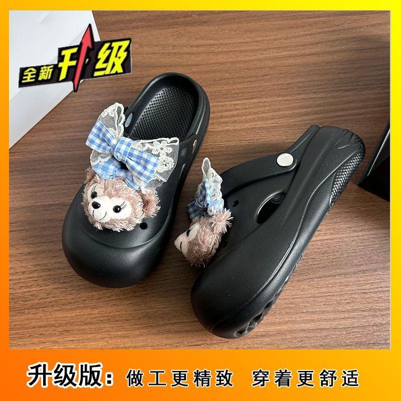 Gruboszelesowe gówno-kroczące torby głowa ciągnąca fajne kapcie słodkie i urocze kreskówkowe kokardki buty z dziurami odzież wierzchnia 2025 lato nowe modele