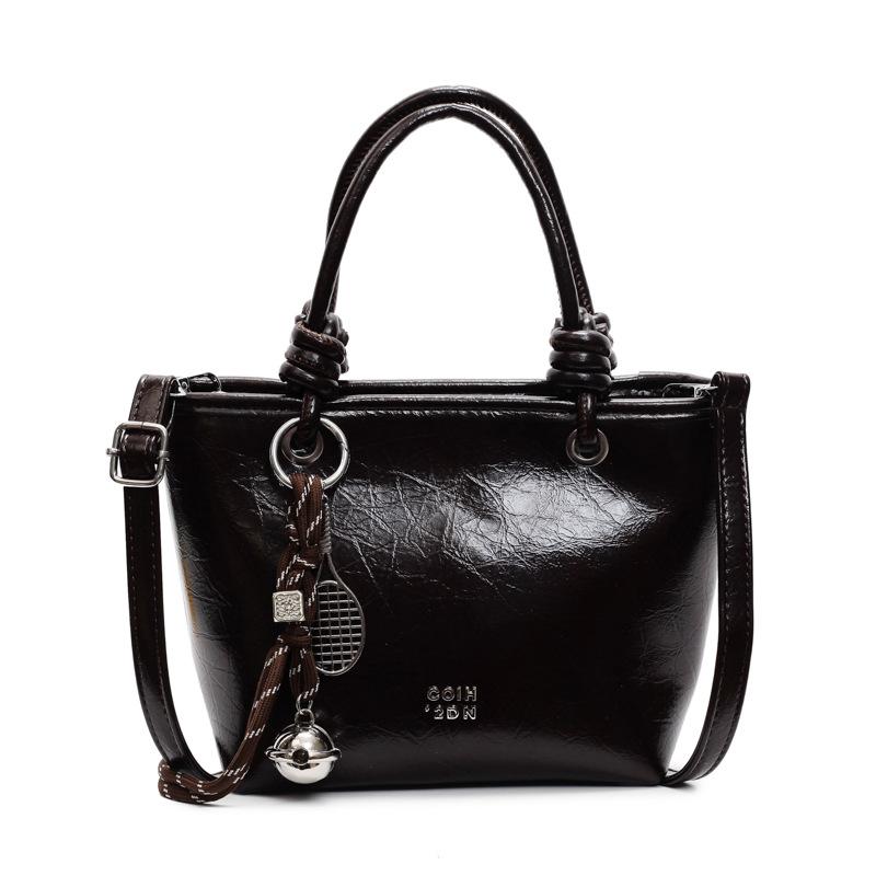 

Простая и стильная сумочка Новая ретро текстура сумка-ведро модная однотонная сумка-мессенджер на плечо для通勤 Without pendant темно-коричневого