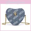 Trendy Soft Denim Shoulder Bag For Women Featuring Chic Heart Design