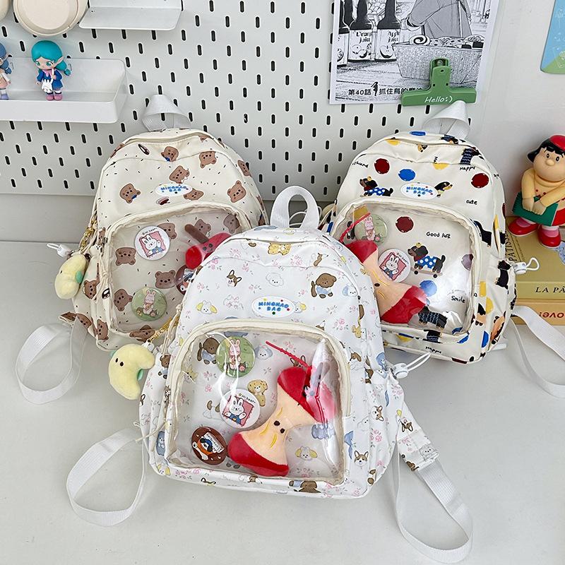Cute graffiti schoolbag for junior high school girls, large capacity backpack, transparent bar, bandage board, pain bag, student backpack