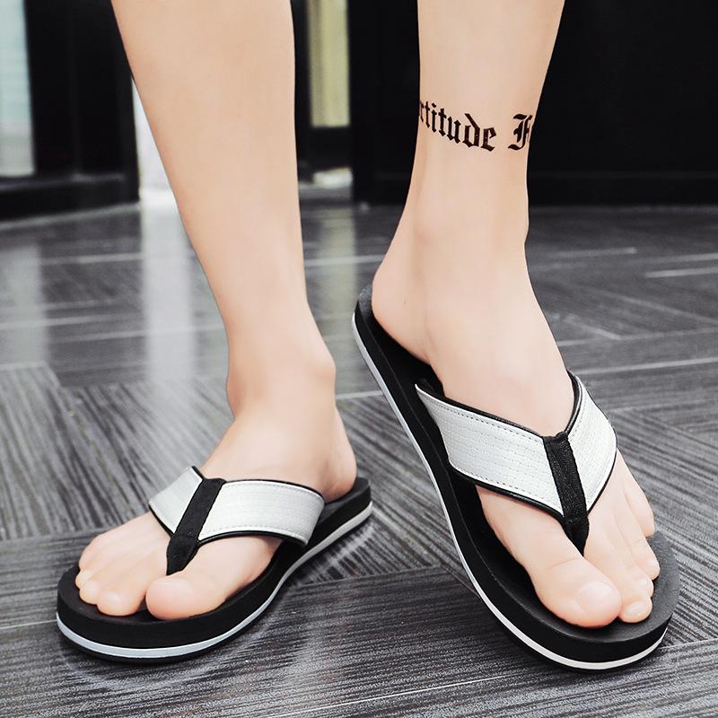Spring new breathable flip-flops fashion casual leather pinch feet men's drag seaside travel large size beach wading shoes