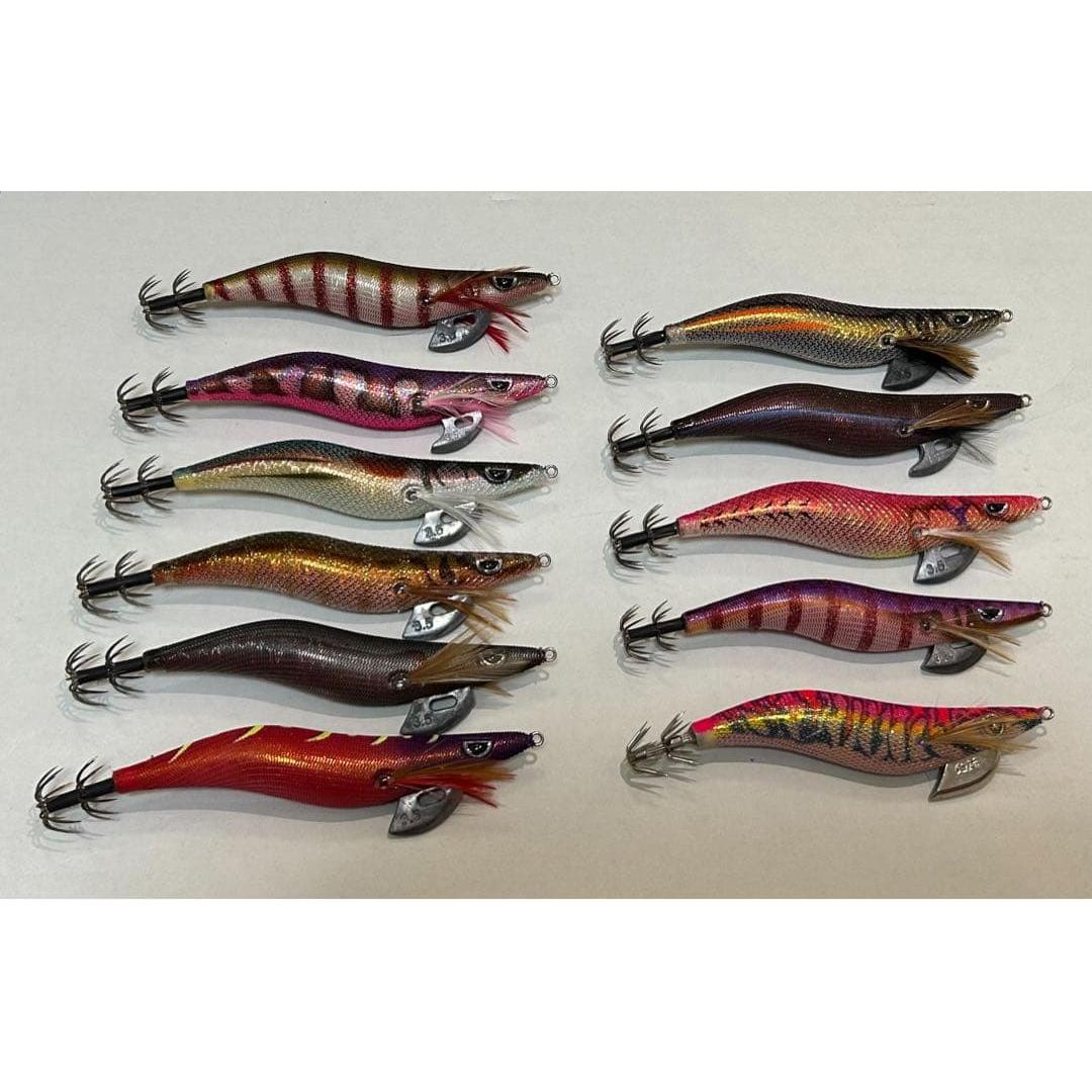 Used Assortment of 23 egi from multiple manufacturers with Daiwa Emeraldas egi case
